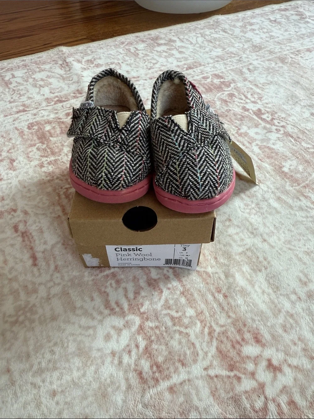 TOMS Baby Slip-On Herringbone Shoes in Black & Pink